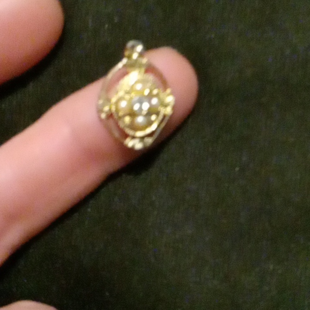 Gold necklace pendant